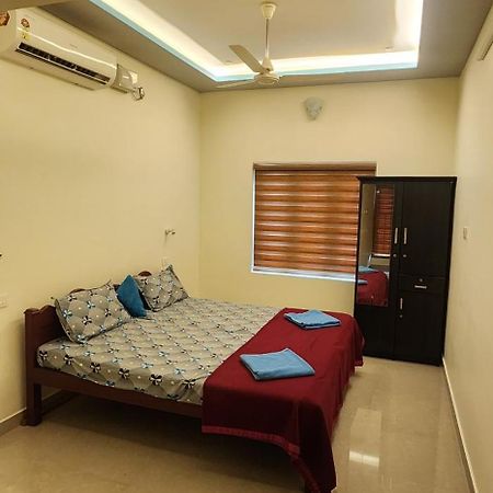 Punerjeni Homes Alappuzha Bagian luar foto