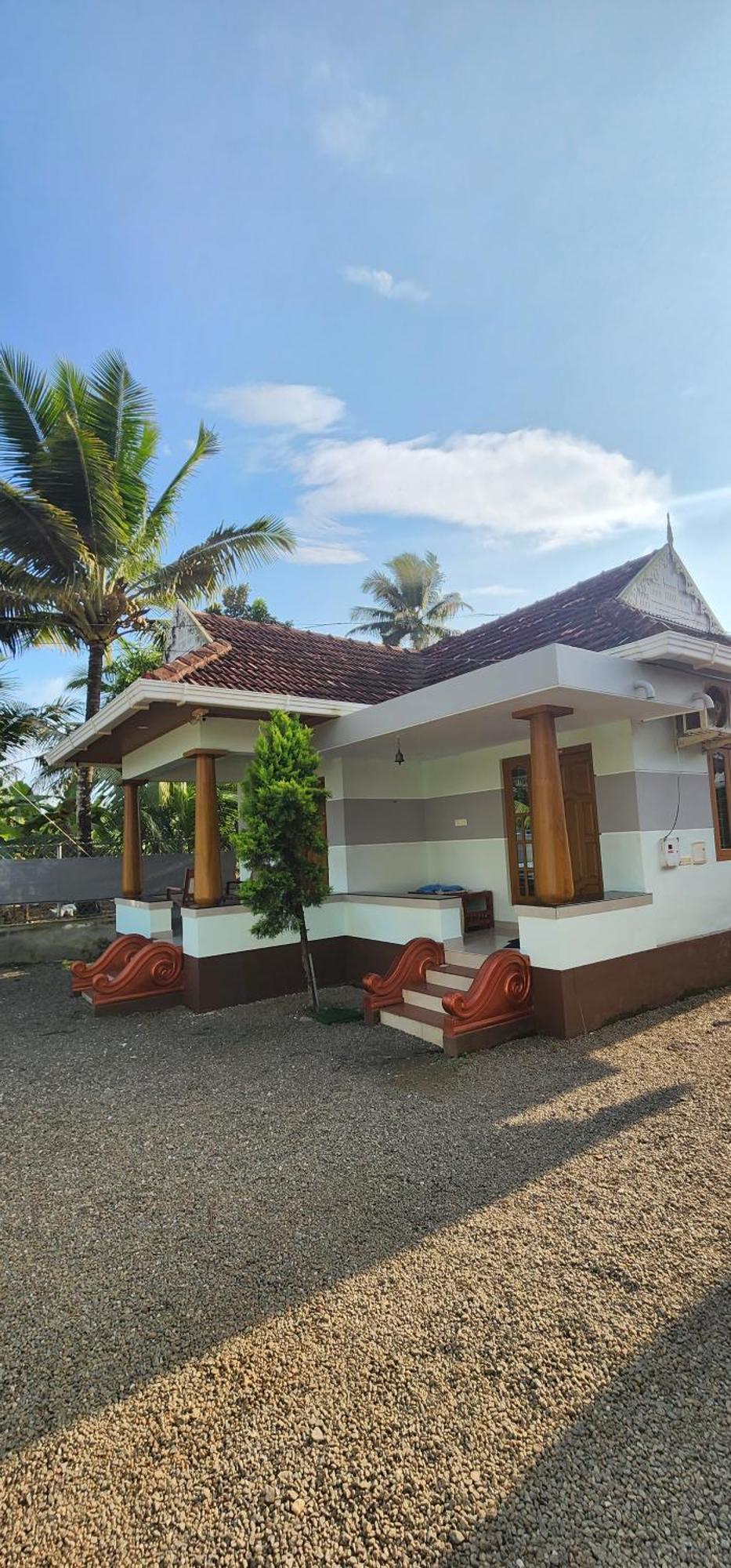 Punerjeni Homes Alappuzha Bagian luar foto