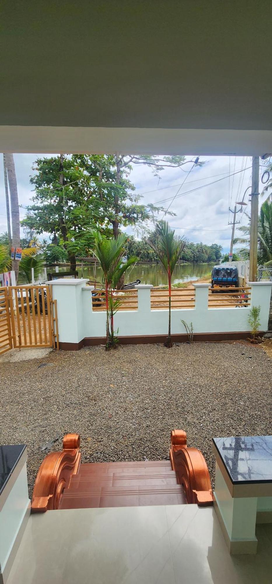 Punerjeni Homes Alappuzha Bagian luar foto
